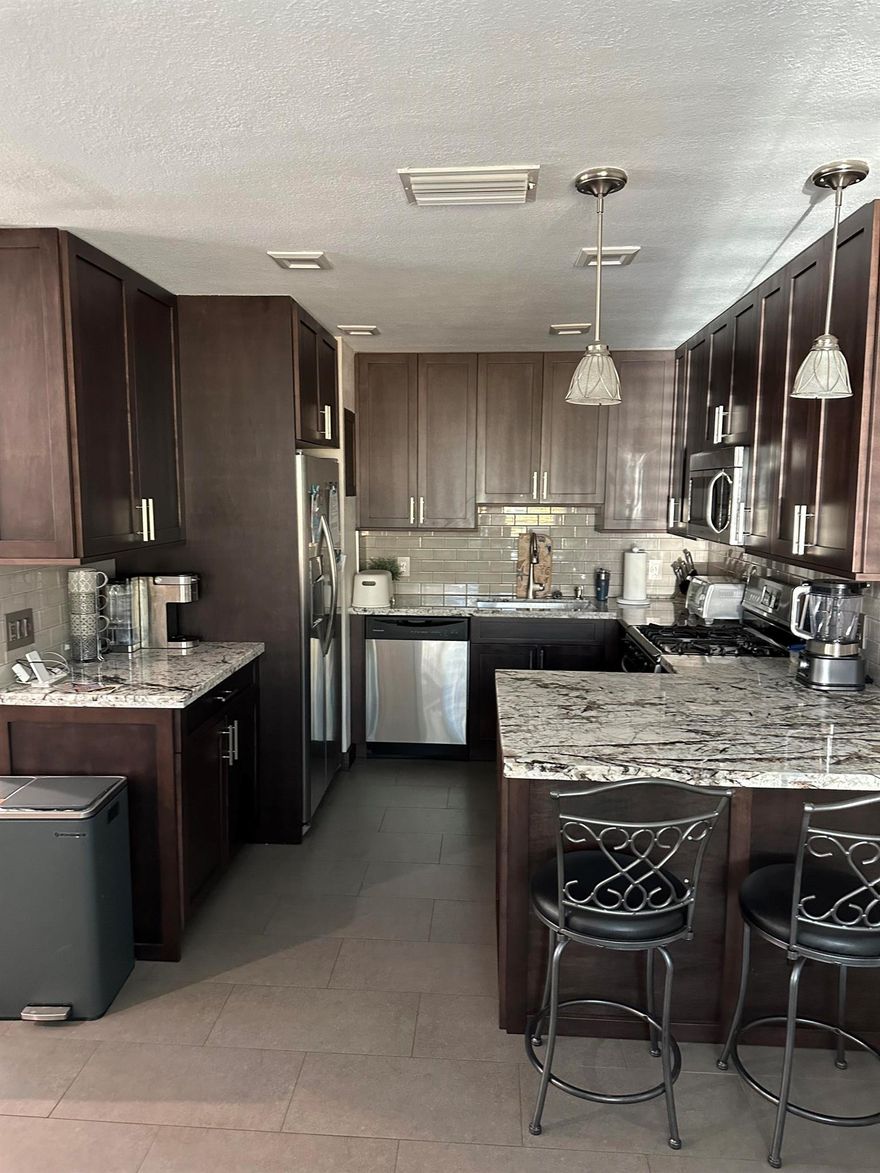 Welcome to your dream rental!this beautiful three-bedroom, Two-bath home features a fully upgraded kitchen with all amenities,perfect for culinary enthusiasts. enjoy a private pool oasis and unique double-sided garage doors for added convenience. nestled one mile from beach, you're minutes away frpm vibrant restaurants, shopping,and all activities that makes Pompano so desirable. this well-maintained property offers both comfort and location.