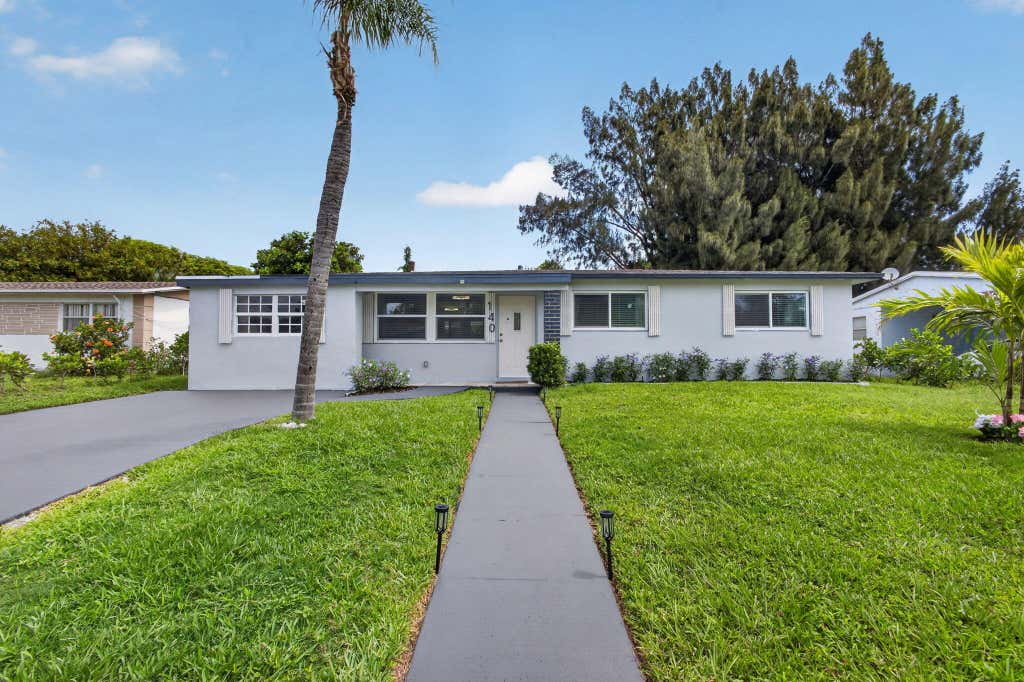 Photo of 140 W 31st Court, Riviera Beach, FL 33404 (MLS # B26054669)