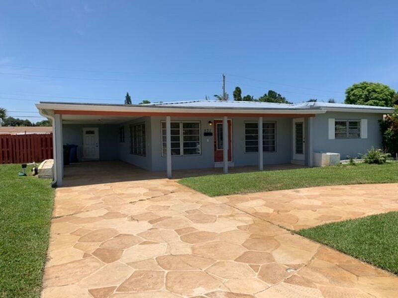 Oakland Park 3 bedroom 2 bath, Pool home with fenced in yard! NO HOA!3 Bedroom 2 bath situated on a large lot in the highly desired neighborhood of Lloyd Estates.Featuring an open-concept kitchen & living space, split floor plan, and beautiful tile flooring!The updated kitchen includes quartz countertops, lovely tiled backsplash and all stainless steel appliances. Bathrooms are beautifully tiled and pristine. Gorgeous light fixtures throughout home; in particular the kitchen lighting and dining room chandelier. Upscale modern Washer/ Dryer in house.Step out into your own private backyard tropical oasis! Beautiful pool with elegant edge, trim, bottom and shape. A lot of space for sunny FL outdoor living; for furniture, BBQ, etc.Large fenced in yard gives the home extra space and