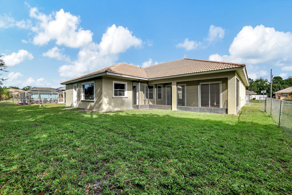 Photo of 6470 NW Regal Circle, Port Saint Lucie, FL 34983 (MLS # R10968477)