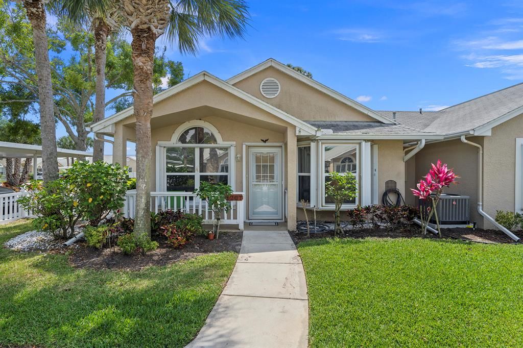 Photo of 1207 NW Lombardy Drive, Port Saint Lucie, FL 34986 (MLS # R10703817)