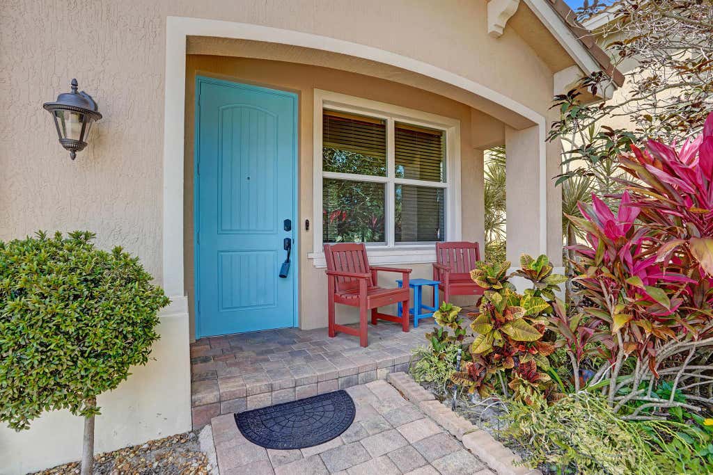 Photo of 841 Palm Tree Lane, Haverhill, FL 33415 (MLS # R11075065)