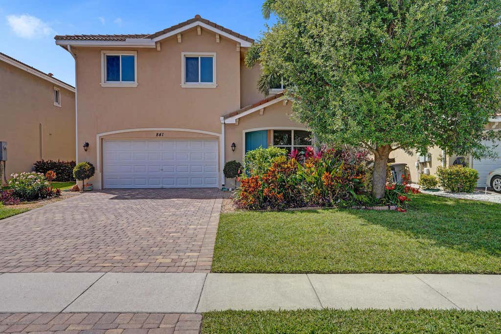 Photo of 841 Palm Tree Lane, Haverhill, FL 33415 (MLS # R11075065)