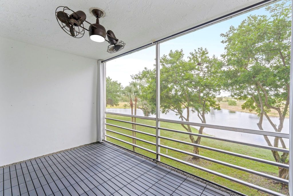 Photo of 3090 N Course Dr #309, Pompano Beach, FL 33069 (MLS # F10541917)