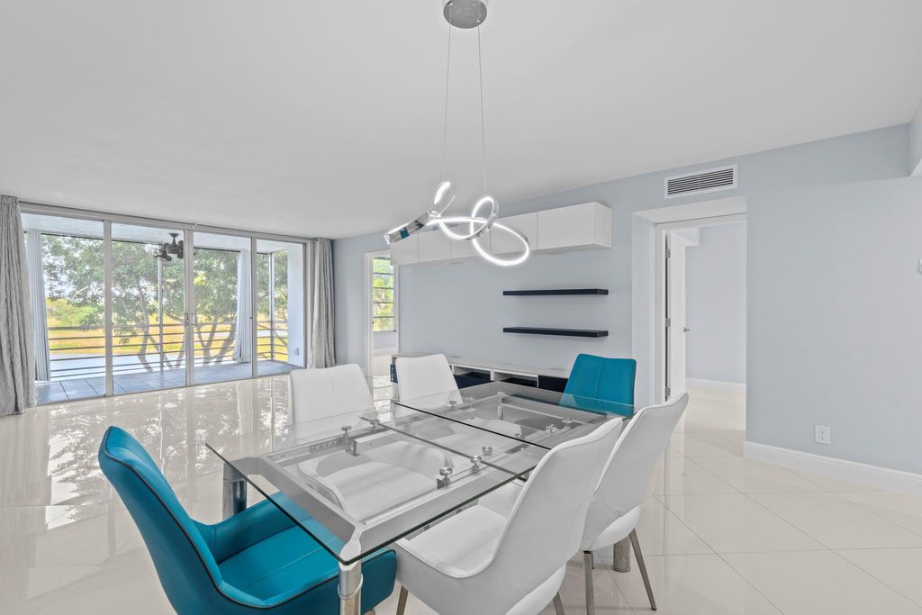 Photo of 3090 N Course Dr #309, Pompano Beach, FL 33069 (MLS # F10541917)