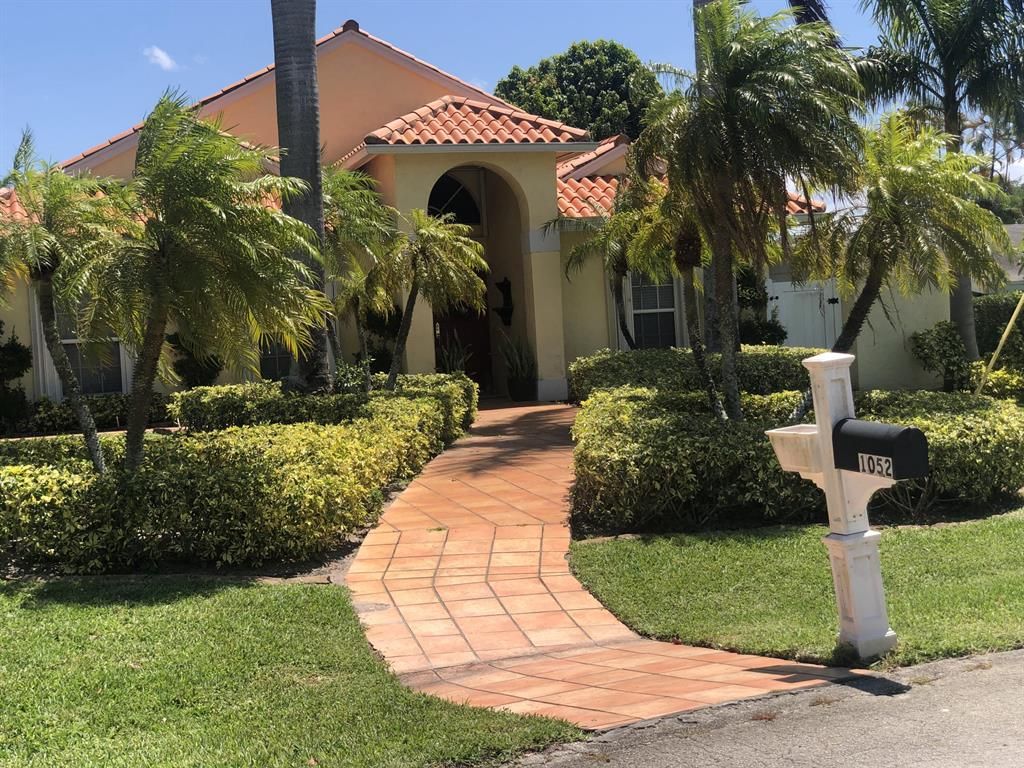 Photo of 1052 W Shore Drive, West Palm Beach, FL 33406 (MLS # R10887628)