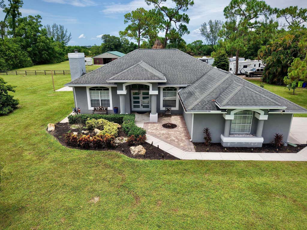 Photo of 14279 43rd Road N, Loxahatchee Groves, FL 33470 (MLS # B26046789)