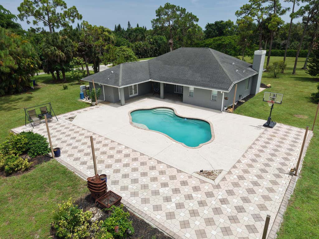 Photo of 14279 43rd Road N, Loxahatchee Groves, FL 33470 (MLS # B26046789)