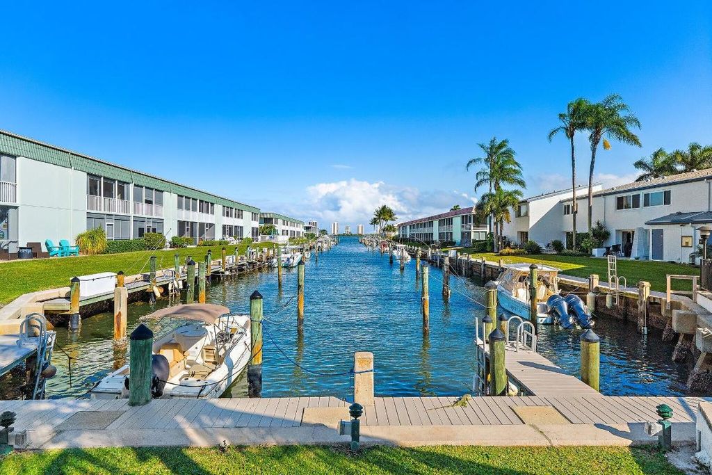 Photo of 118 Castlewood Drive #123, North Palm Beach, FL 33408 (MLS # R11157869)