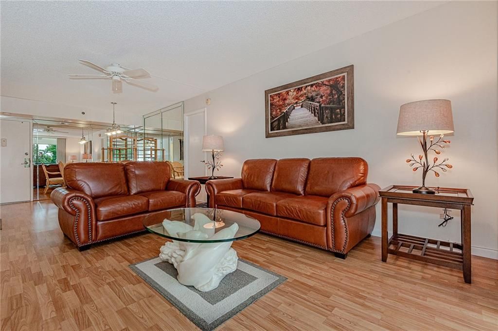 Photo of 1100 Saint Charles Place #302, Pembroke Pines, FL 33026 (MLS # F10332961)