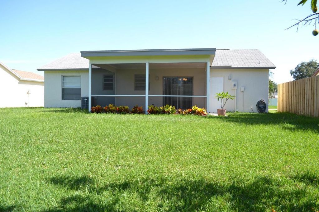 Photo of 135 Village Circle, Jupiter, FL 33458 (MLS # R11062198)