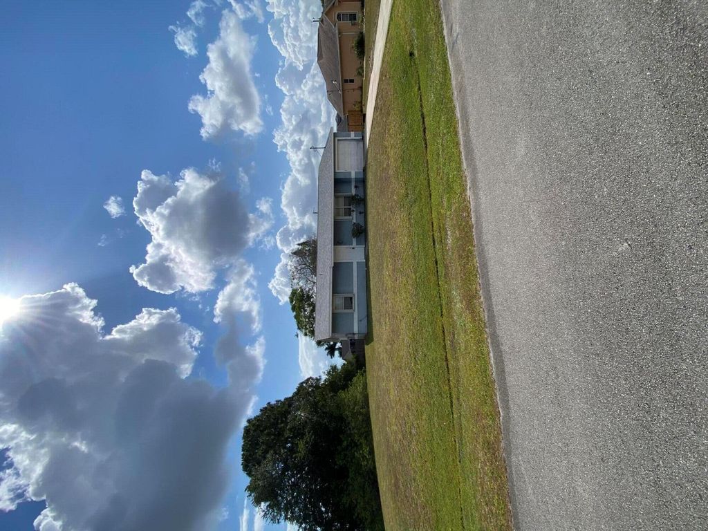 Photo of 649 SW Heather Street, Port Saint Lucie, FL 34983 (MLS # R11098379)