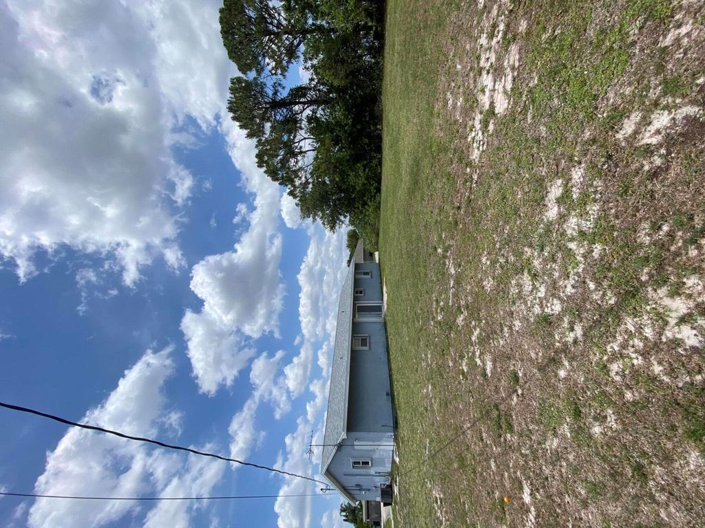 Photo of 649 SW Heather Street, Port Saint Lucie, FL 34983 (MLS # R11098379)
