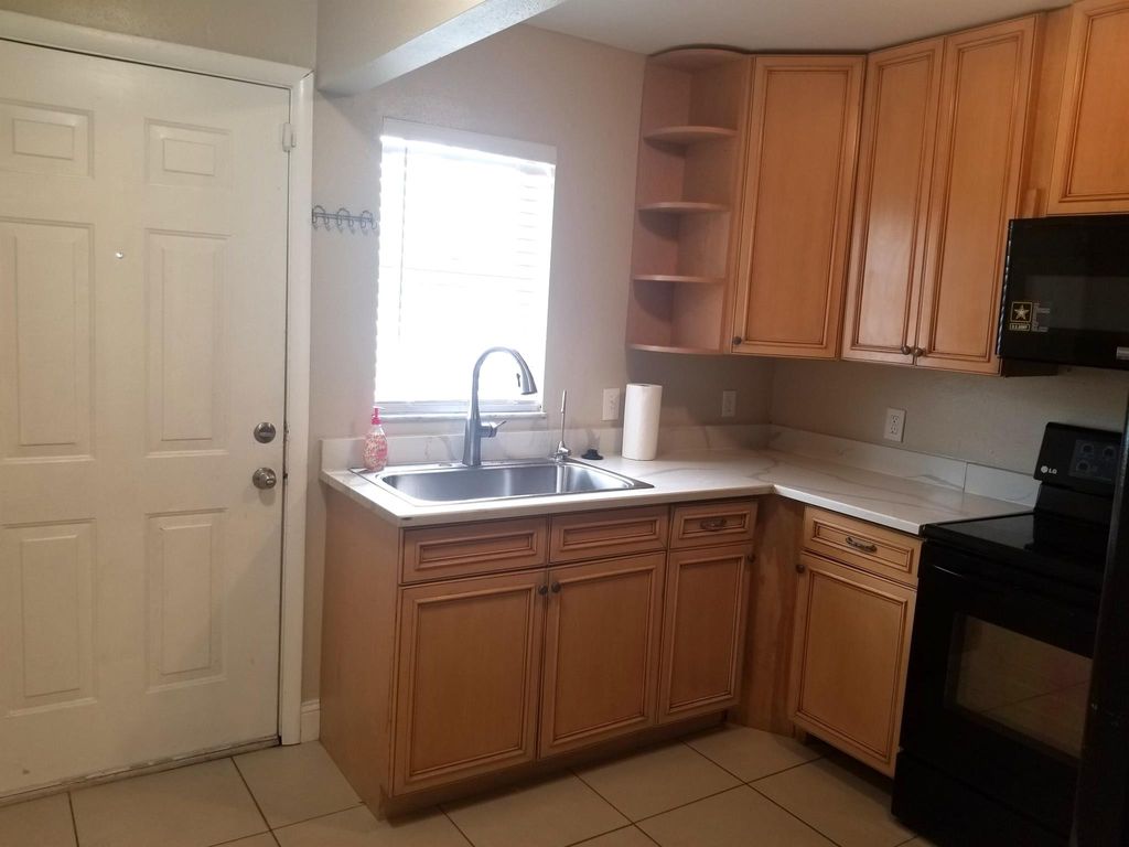 Photo of 605 Ixoria Avenue #1b, Fort Pierce, FL 34982 (MLS # R11010184)