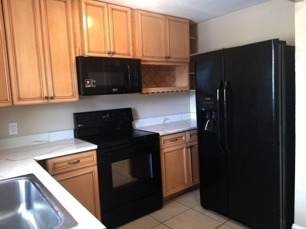 Photo of 605 Ixoria Avenue #1b, Fort Pierce, FL 34982 (MLS # R11010184)