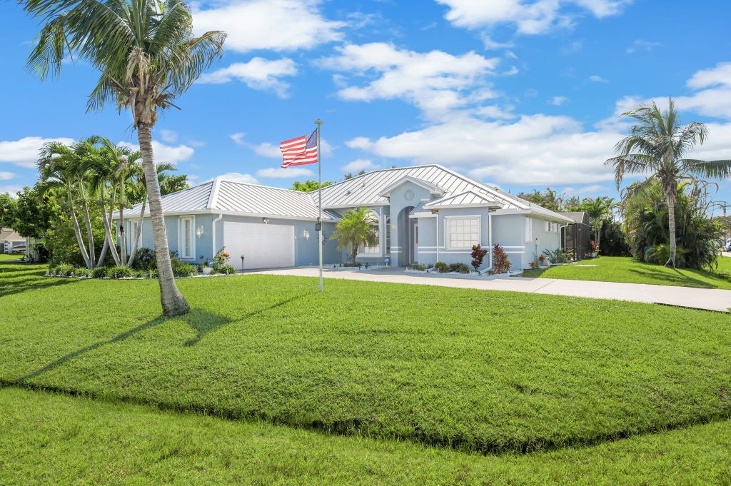 Photo of 2891 SE Buccaneer Circle, Port Saint Lucie, FL 34952 (MLS # B26080611)