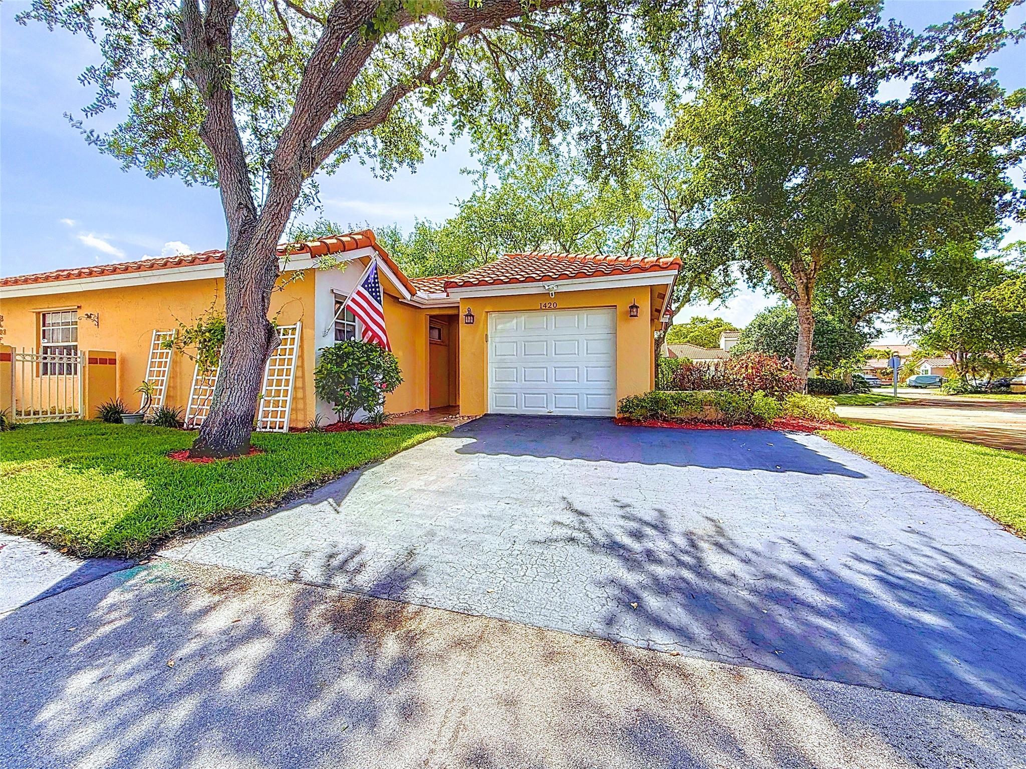 Welcome to your new home! A beautifully maintained 3BR, 2BA home in Weston’s desirable Country Isles Garden Homes. Located on a quiet cul-de-sac, this single-story gem features vaulted ceilings, bay windows, and abundant natural light. Enjoy tile and luxury flooring throughout, an updated kitchen with wood cabinets, modern counters, and stainless steel appliances. Both bathrooms are tastefully remodeled. Relax on the screened patio or in the fenced backyard—ideal for kids, or entertaining. Additional highlights include a newer roof, A/C, and water heater approx. 2017. Minutes to Weston Town Center, top-rated A+ schools, parks, dining, and major highways. Low HOA $166/month includes pool and clubhouse. Move-in ready and full of charm!