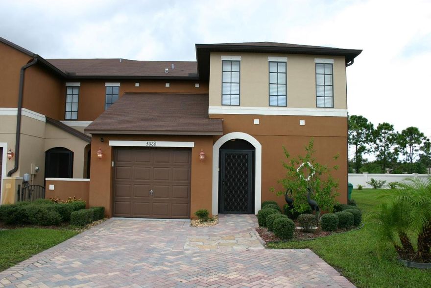 Three words: Move In Ready! This two-story townhome in Villas of Torino is sure to please. The Abigail model is an end unit with the master suite downstairs and two bedrooms plus a loft upstairs. The first floor is concrete block construction and second floor is frame. Originally built by Mercedes the property is now being sold by the original owner. 

There is a formal dining room that has entry to the kitchen where the owner added additional storage above and around the refrigerator. Oak cabinets have a rich, warm appearance. The stove was just replaced in September. 

Soaring ceilings will greet you in the main living room at the back of the property. 

Escape out to the back patio and enjoy a cup of coffee on the additional open patio beyond the covered porch. (See ''more'' in ML Delight in scenic garden views that the owner has added on the property. The front entry has a screened security door and the back patio is also screened to enjoy that cooler weather we are soon expecting. 

Did we mention the master suite is downstairs?! The master bath has a combo tub/shower and a walk in closet. Guests can use the half bath that is also located downstairs.

Upstairs are two bedrooms and a loft that looks over the living room below. The second bedroom is as large as the master suite below and has a walk-in closet. The third bedroom also boasts ample room and a second bathroom is situated between both bedrooms upstairs. The washer and dryer are upstairs.

One car garage but parking for two cars in the brick paver driveway. Gutters on the entire building. 

The furnishings could be negotiable if you are looking for turn-key.

Villas of Torino has a community pool and gazebo. The affordable association fee of $125 a month covers lawn care, spray for weeds in driveway & walkway, irrigation, and exterior pest control. Owners need to maintain insurance on their own units. Pet restrictions and HOA application fee need to be verified.

Travel to St Lucie West in 4 miles and find shopping, entertainment, and restaurants galore. Interstate 95 can be accessed off Midway Road in 3.5 miles. Shoot a round of golf at the PGA, take in a movie in St Lucie West, or catch a ball game when the Mets are in town - all within 5 miles or less! The town of Tradition and all their amenities are 2 exits south on I-95.