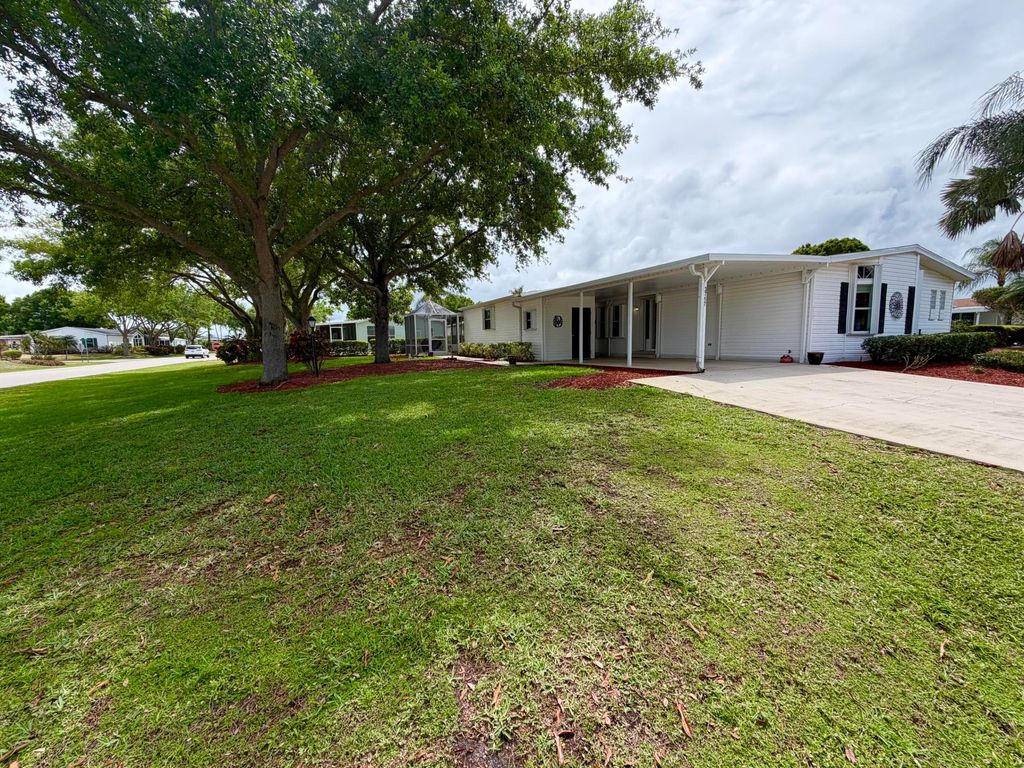 Photo of 3717 Fetterbush Court, Port Saint Lucie, FL 34952 (MLS # B26012419)