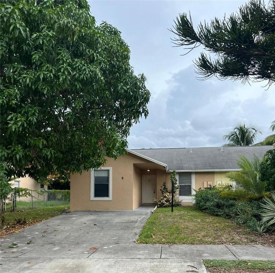 Spacious 4-bedroom, 2-bath half duplex located in desirable Deerfield Beach. This well-maintained home features tile flooring throughout the main living areas, a functional kitchen with wood cabinetry, and a full-size washer and dryer for added convenience. Ideally situated near schools, shopping, dining, beautiful beaches, and major highways, providing easy access to everything South Florida has to offer.