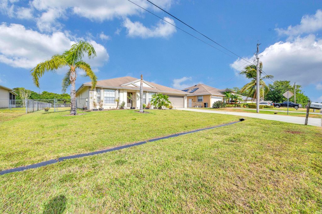 Photo of 3774 SW Hale Street, Port Saint Lucie, FL 34953 (MLS # R10982290)