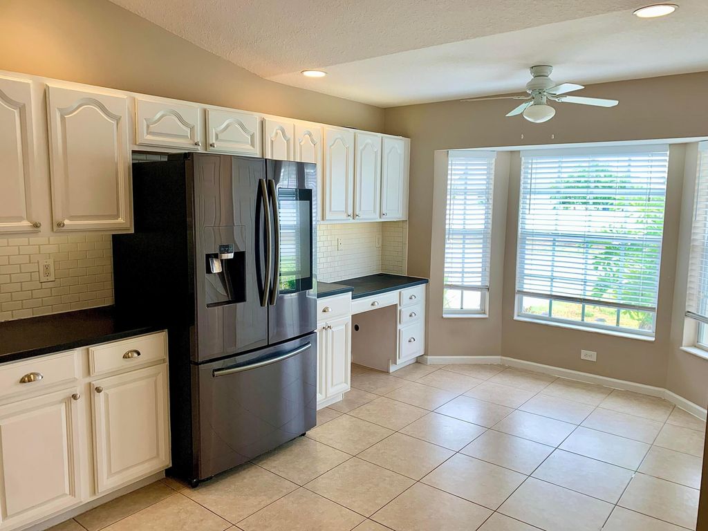 Photo of 3774 SW Hale Street, Port Saint Lucie, FL 34953 (MLS # R10982290)