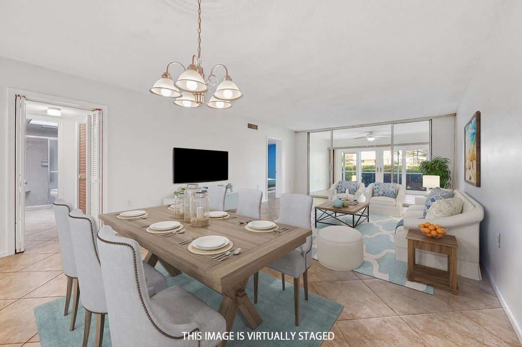 Photo of 145 Atlantis Boulevard #103, Atlantis, FL 33462 (MLS # R11078206)