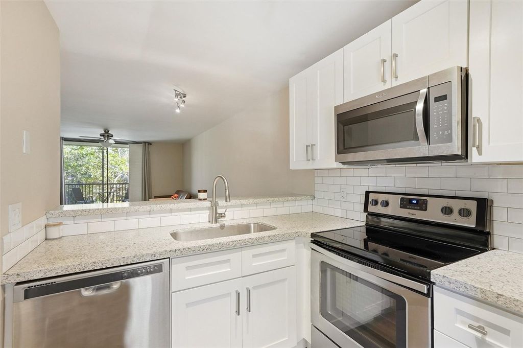 Photo of 10551 W Broward Boulevard #310, Plantation, FL 33324 (MLS # F10548550)