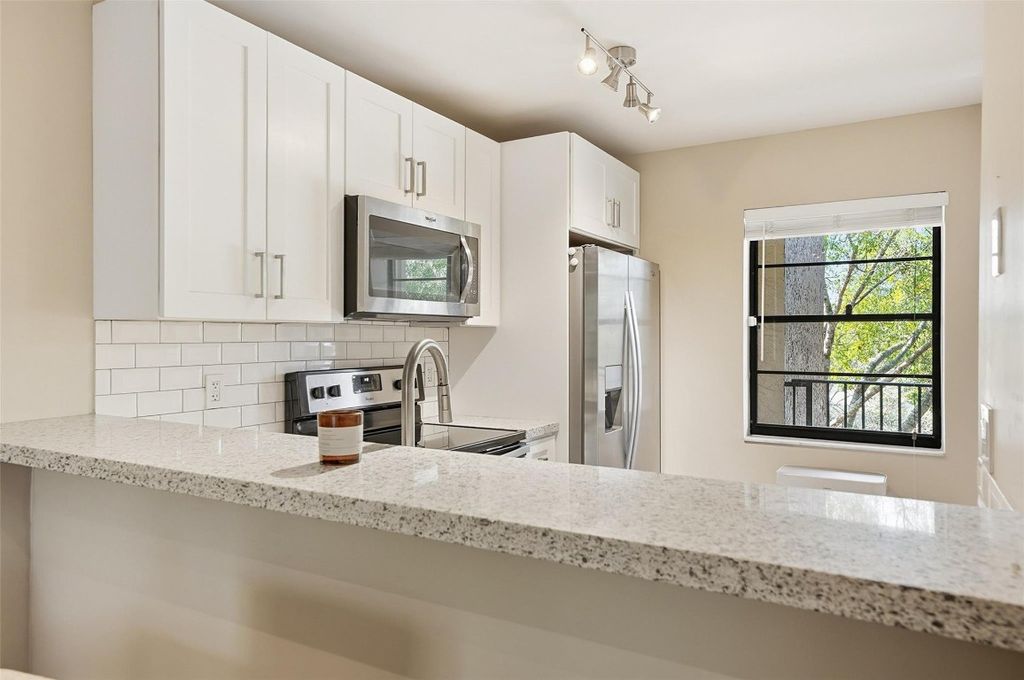 Photo of 10551 W Broward Boulevard #310, Plantation, FL 33324 (MLS # F10548550)