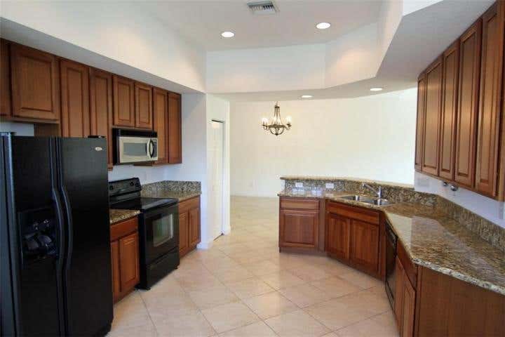 Photo of 3485 SW Sawgrass Villas Drive #6-d, Palm City, FL 34990 (MLS # B26036334)