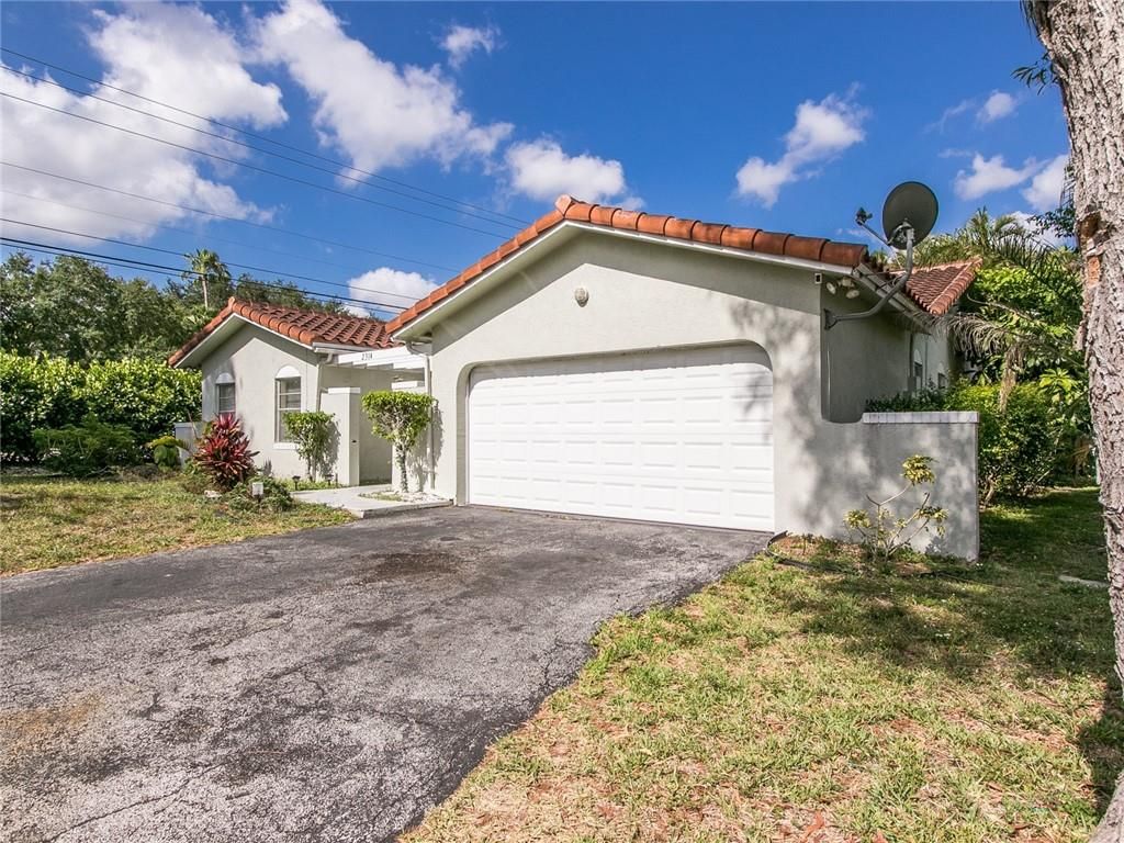 Photo of 2314 NW 98th Ter, Coral Springs, FL 33065 (MLS # F10302362)