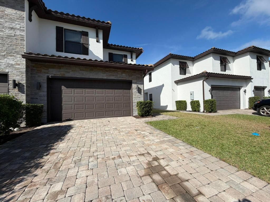 Photo of 329 Bella Sol Way, West Palm Beach, FL 33406 (MLS # R11148832)