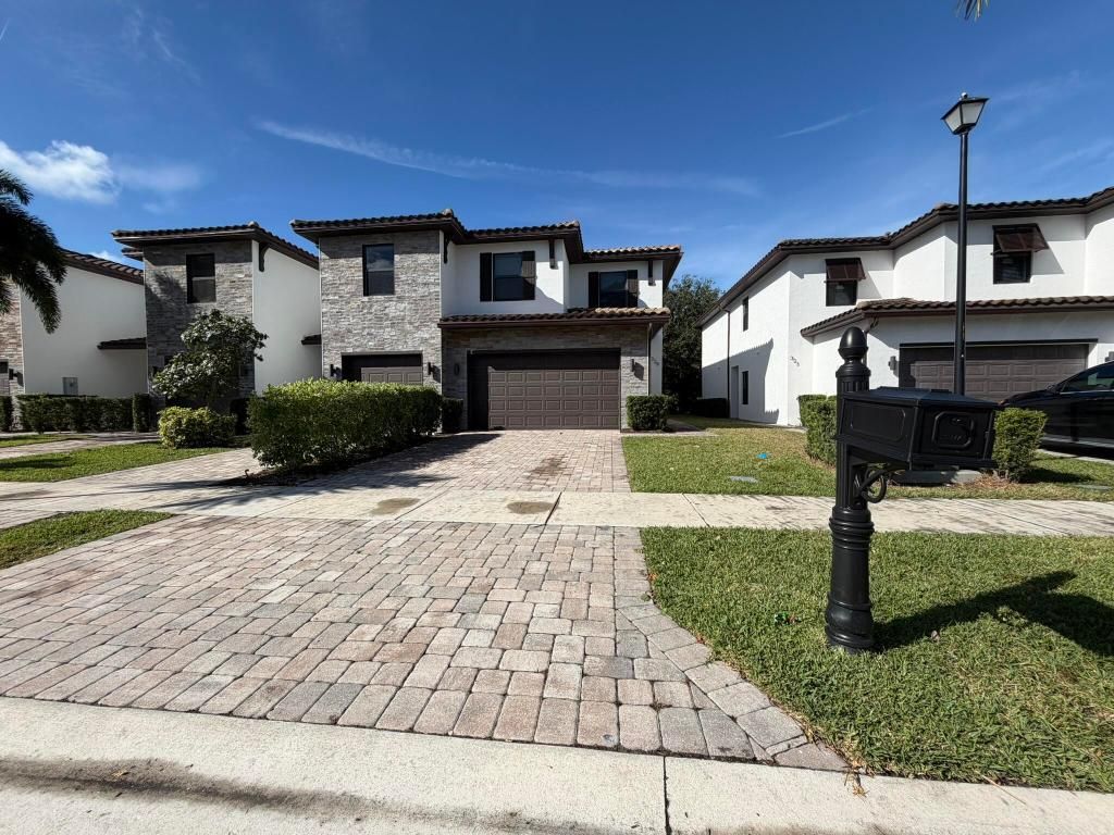 Photo of 329 Bella Sol Way, West Palm Beach, FL 33406 (MLS # R11148832)