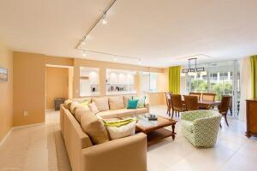 This spacious, stunning, very desirable, fully renovated condo is very well-taken care of and ready to move in with all appliances TV, furniture, drapes, washer and dryer, ceiling fans, beach gear and kitchen utensils, included.  Both bathrooms and the kitchen have been fully renovated.  Open concept kitchen, dining and living space:  great water view, spacious screened in patio with lounge chairs and outdoor table.  Friendly community with walking trails along the intracoastal.  Parking and guest parking in gated community.  Pool and beach access, library, tennis, outdoor barbecue and other amenities included.  Close to I-95 and only a few minutes away from the beach and the ocean.  A small dog is allowed, but must be approved by owners.
