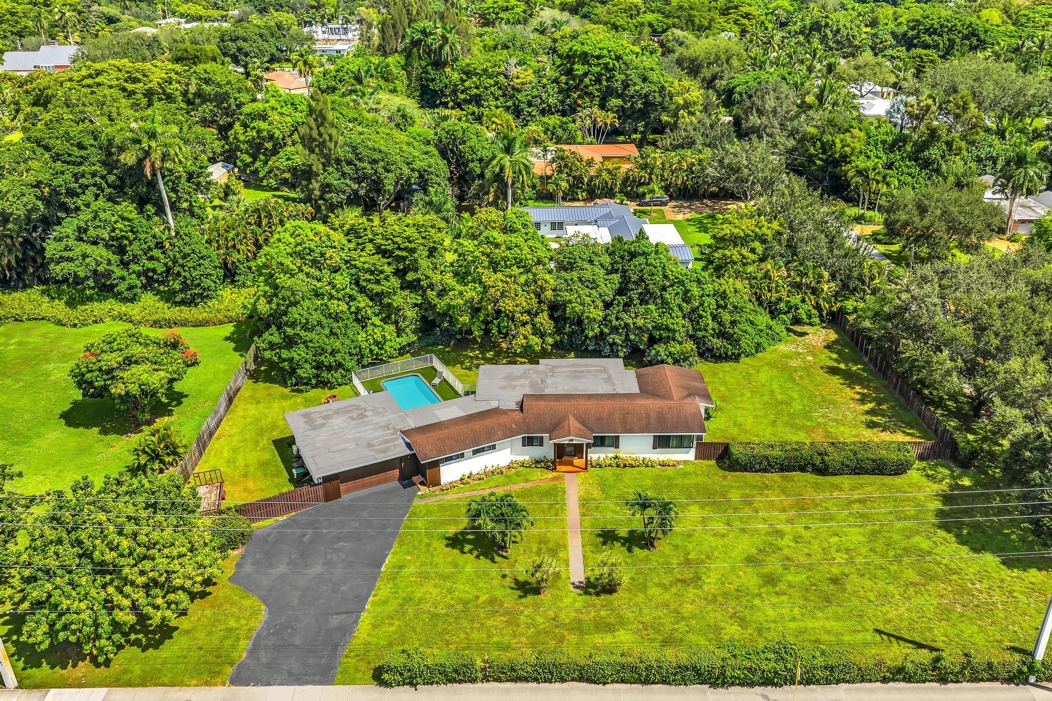 THIS HOME HAS IT ALL!!! HUGE CORNER LOT ALMOST AN ACRE FULLY REMODELED IMPACT WINDOWS & DOORS, NEW KITCHEN W/STAINLESS APPLIANCE , 4 FULL BEDROOMS 3 BATHROOMS ,BIG GARAGE, VERY LARGE MASTERS SUITS + SEPARATE BONUS ROOM CAN BE USEDAS 5TH BEDROOM . THE KITCHEN OPENS TO THE LIVING ROOM . AN OVERSIZED YARD, LARGE POOL AND HOTTUB , IT'S THE PERFECT HOME FOR ENTERTAINING! UPDATED ELECTRICAL, AND NEWER AC SYSTEM. THIS AREA IS CLOSE TO HIGHWAYS, AIRPORT, BEACHES, VERY CONVENIENT LOCATION. CAN BE USED AS AN AIRBNB .COME CHECK IT OUT BEFORE IT'S GONE!