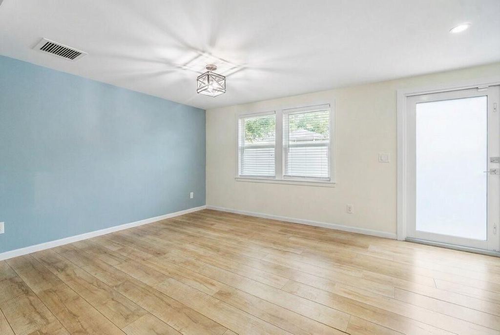 Photo of 353 E Lakewood Road, West Palm Beach, FL 33405 (MLS # B26018133)