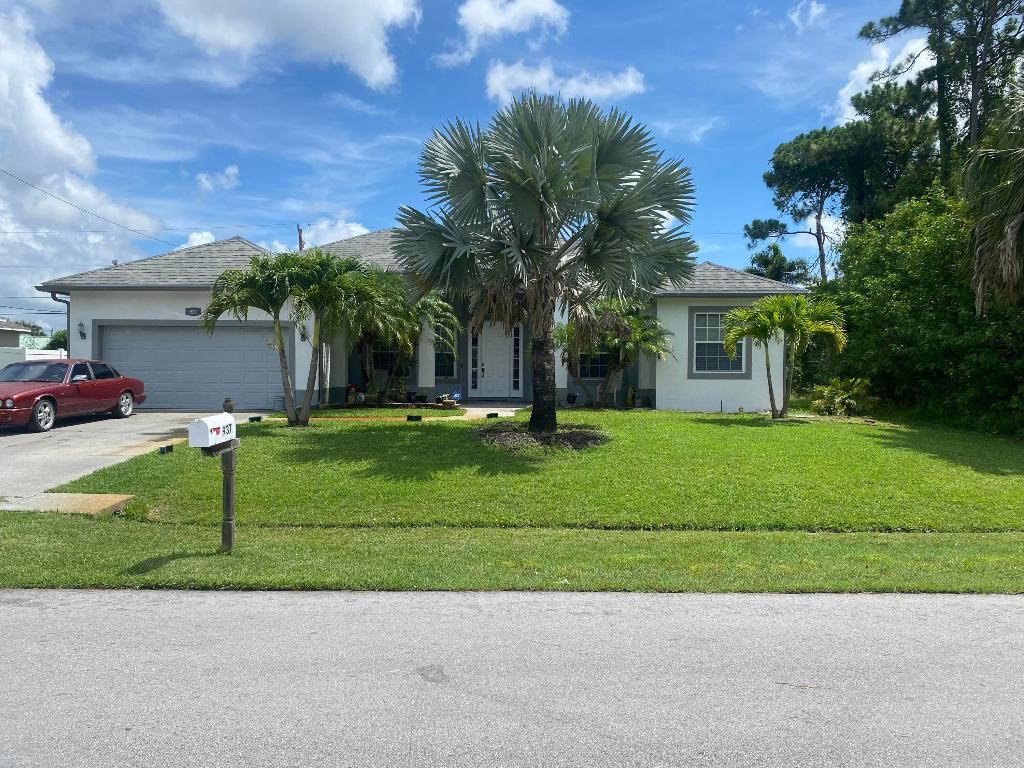 Photo of 937 SW Eureka Avenue, Port Saint Lucie, FL 34953 (MLS # R10996808)