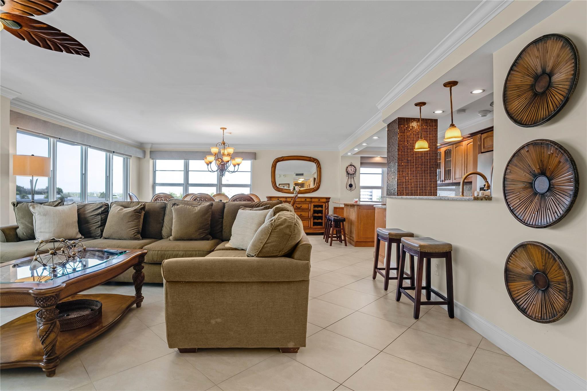 GREAT LOCATiION, IN THE HEART OF POMPANO BEACH, BEAUTIFUL UPDATED CONDO WITH OPEN BALCONY. BEAUTIFUL BEACH, PIER AND PRIME RESTAURANTES, CLOSE TO GOLF COUSES, TENNIS COUTS AND LOTS OF ENTERTENIMENTS. UNIT WITH VIEWS OF THE CITY AND OCEAN. 24 HR SECURITY-COVERED GARAGE-GYM AND A HEATED POOL. OPEN FLOOR PLAN RENOVATED KITCHEN WIT GRANITE COUNTER TOPS AND TOP SS APPLIANCES. LARGE MASTER BEDROOM, WALK-IN CLOSET AND RENOVATED BATHROOMS WITH LOTS OF CABINET SPACE. GUEST BEDROOM WITH 2 CLOSETS. THE UNIT IS FURNISH WITH A HIGHT QUALITY BUILT-INS AND FURNITURE, SEPARETED LAUNDRY-ROOM WITH GREAT STORAGE SPACE. ALSO A SMALL OFICE SPACE. THIS UNIT WAS ORIGINALLY 3 BED - 2 BATH AND WAS TOTALLY RENOVATED TO A 2 BED 2 BATH, IT WAS COMPLETED WITH ALL PERMITS CLOSED.