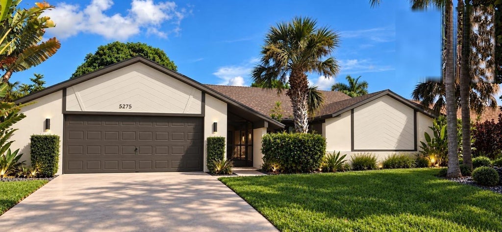 Photo of 5275 OUACHITA Drive, Lake Worth, FL 33467 (MLS # B26090152)