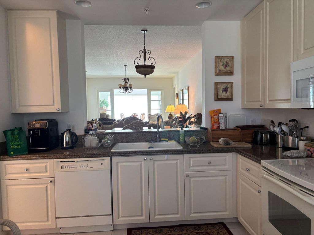 Photo of 24 Harbour Isle Drive W #305, Fort Pierce, FL 34949 (MLS # R11169479)