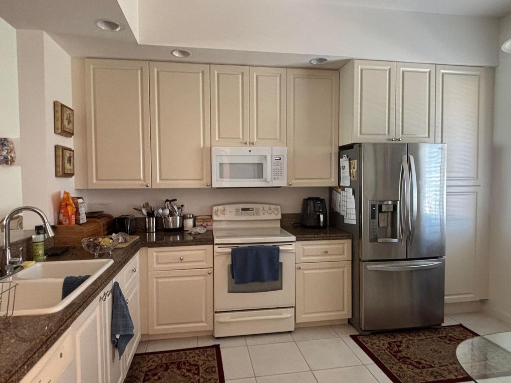 Photo of 24 Harbour Isle Drive W #305, Fort Pierce, FL 34949 (MLS # R11169479)