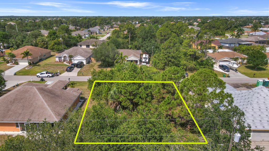 Photo of 131 SW Sea Lion Road, Port St Lucie, FL 34953 (MLS # R10793610)
