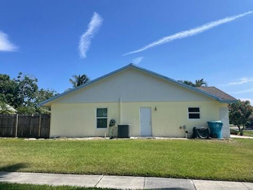 Photo of 1206 NW 10th Street, Boynton Beach, FL 33426 (MLS # R10995490)