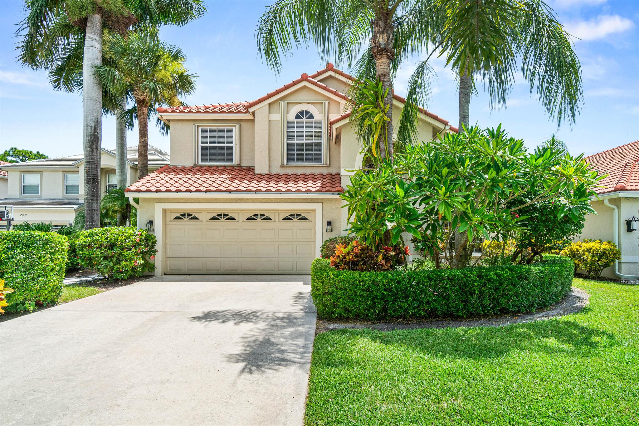 BRAND NEW ROOFWelcome home to this beautifully maintained 4-bedroom, 3-bath home in the sought-after Hammock Trace neighborhood in Jupiter. Enjoy peace of mind with a brand new roof and accordion shutters for hurricane protection. Inside, you'll find updated bathrooms, elegant wood flooring, and brand-new carpet upstairs. The spacious screened-in pool area offers serene lake views--perfect for relaxing or entertaining. Your own tropical paradise Freshly painted interior. Nothing to do here! Ideally located close to all that Jupiter has to offer. This home combines comfort, style, and convenience in one exceptional package. Schedule your visit today.