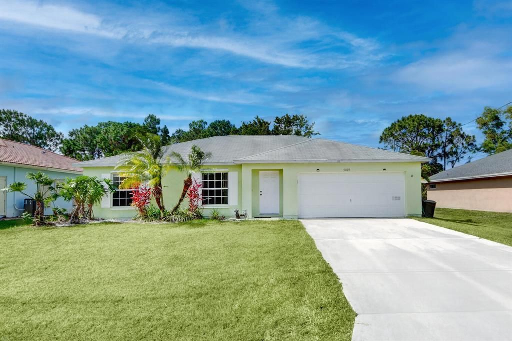 Photo of 5809 NW Erin Avenue Ave, Port St Lucie, FL 34986 (MLS # R10723220)