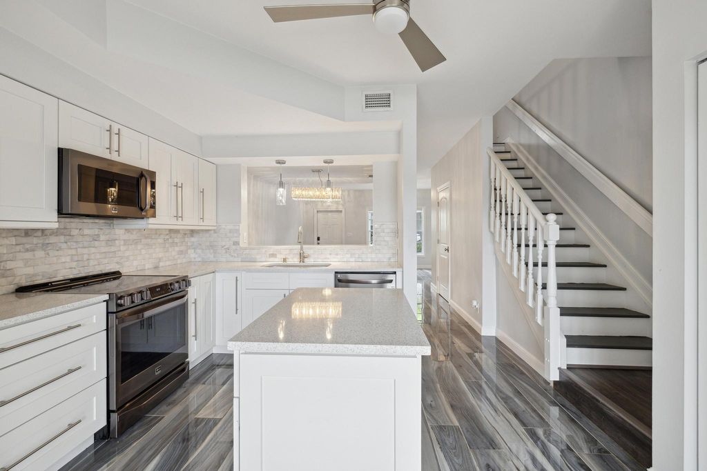 Photo of 1075 Kokomo Key Lane, Delray Beach, FL 33483 (MLS # R10966634)