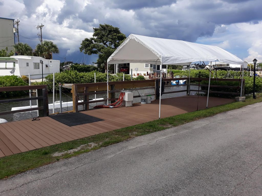 Photo of 22 S Loafing Street, Hypoluxo, FL 33462 (MLS # B26015409)