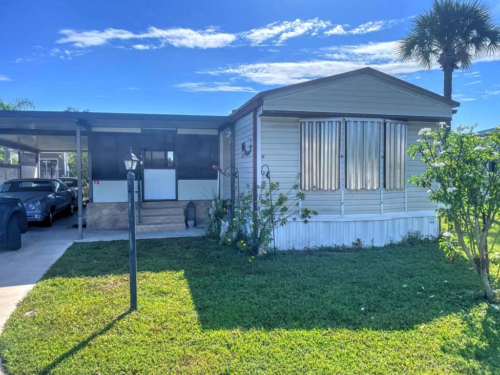 Photo of 7319 43RD Way N, Riviera Beach, FL 33404 (MLS # B26066877)
