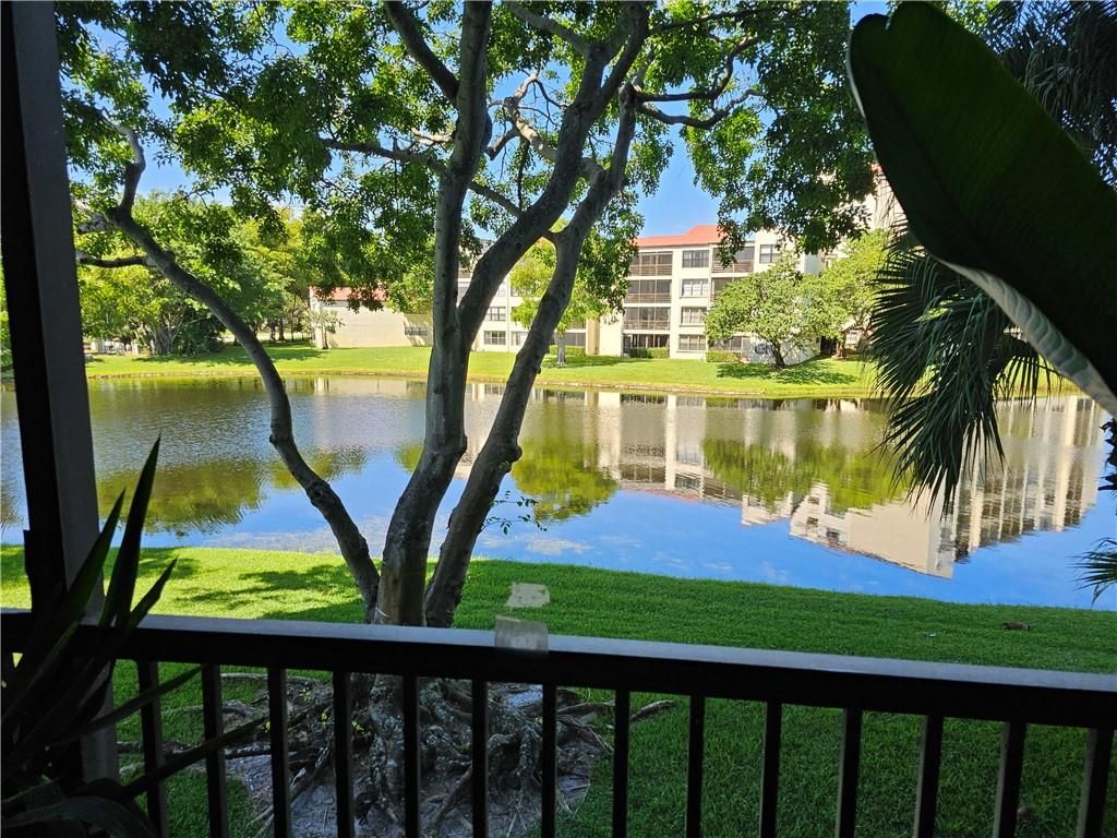 Photo of 2221 Cypress Island Dr #202, Pompano Beach, FL 33069 (MLS # F10379011)