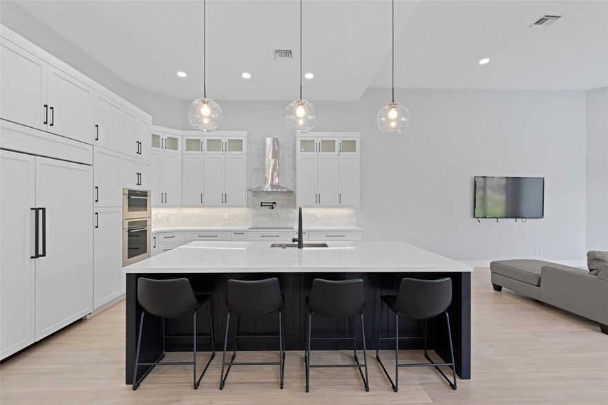 RARELY AVAILABLE! Completely updated 4/3 + office in the prestigious community of Lake Estates at Rolling Hills! Situated on a premium waterfront lot with a pool and Jacuzzi! High quality, modern finishes throughout the entire home! Soaring volume ceilings and a spacious open floor plan give you plenty of space for the entire family! Entertain in your huge gourmet kitchen and oversized island or unwind in your breathtaking master bathroom with massive walk in shower with a large rainfall shower head & his and her closets! 2 car garage with golf cart access! Close to highways and everything Davie has to offer with the security of a guard gated community. A+ schools!!